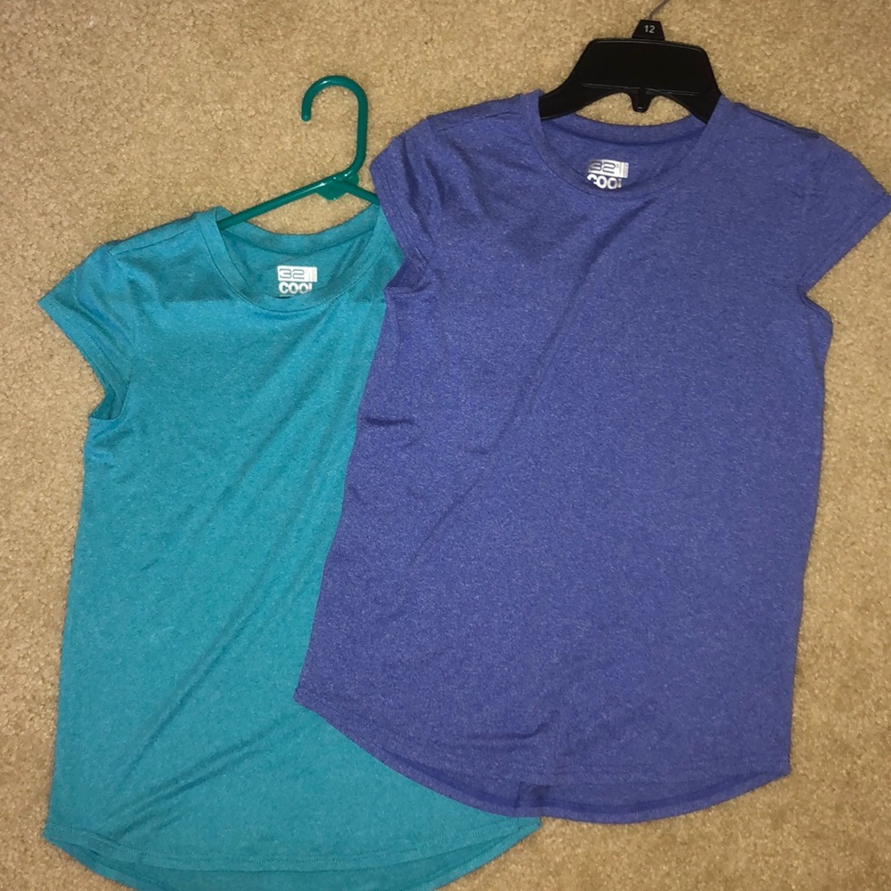 2 girl’s medium workout shirts